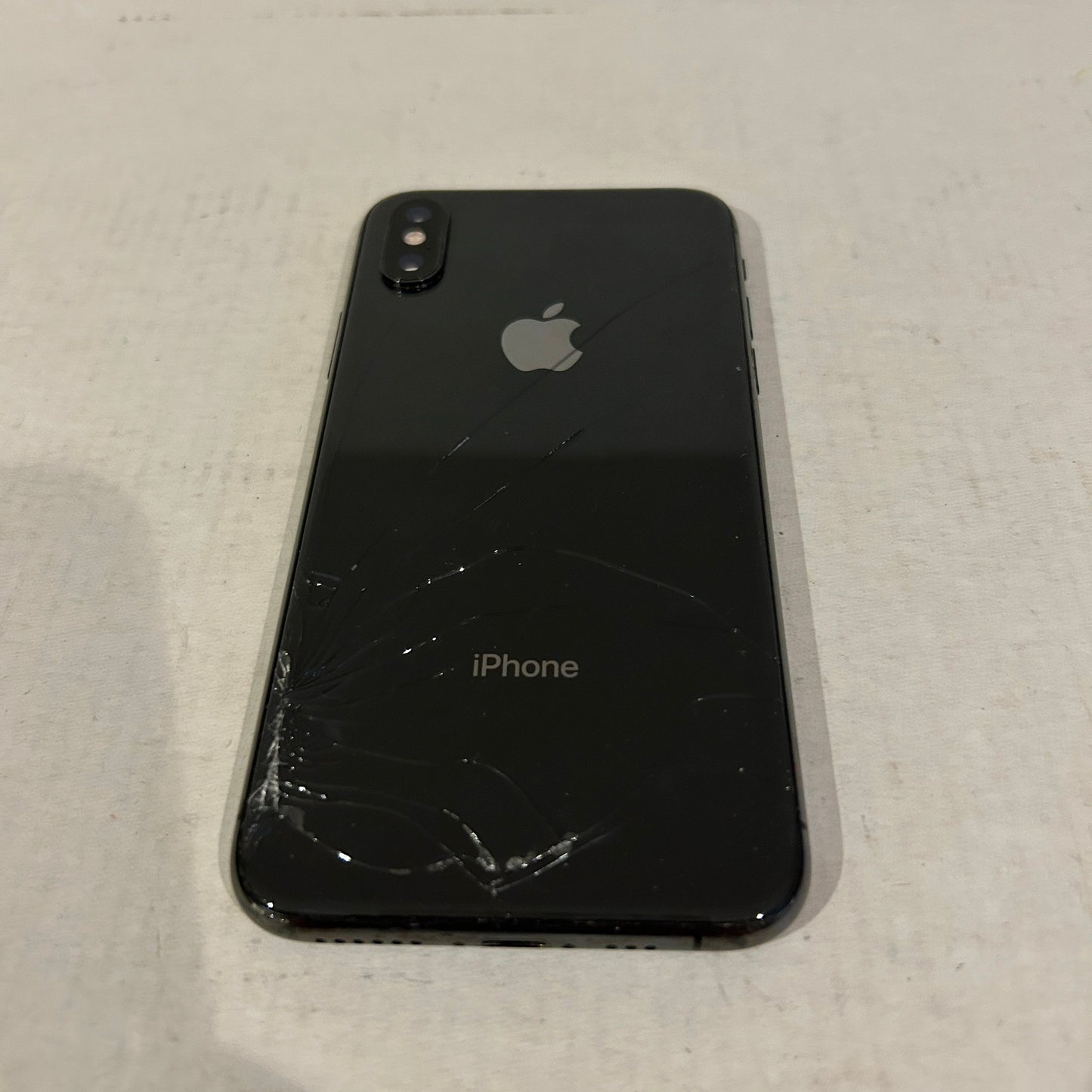 As is: Black 64 GB iPhone Xs Unlocked - Cracked