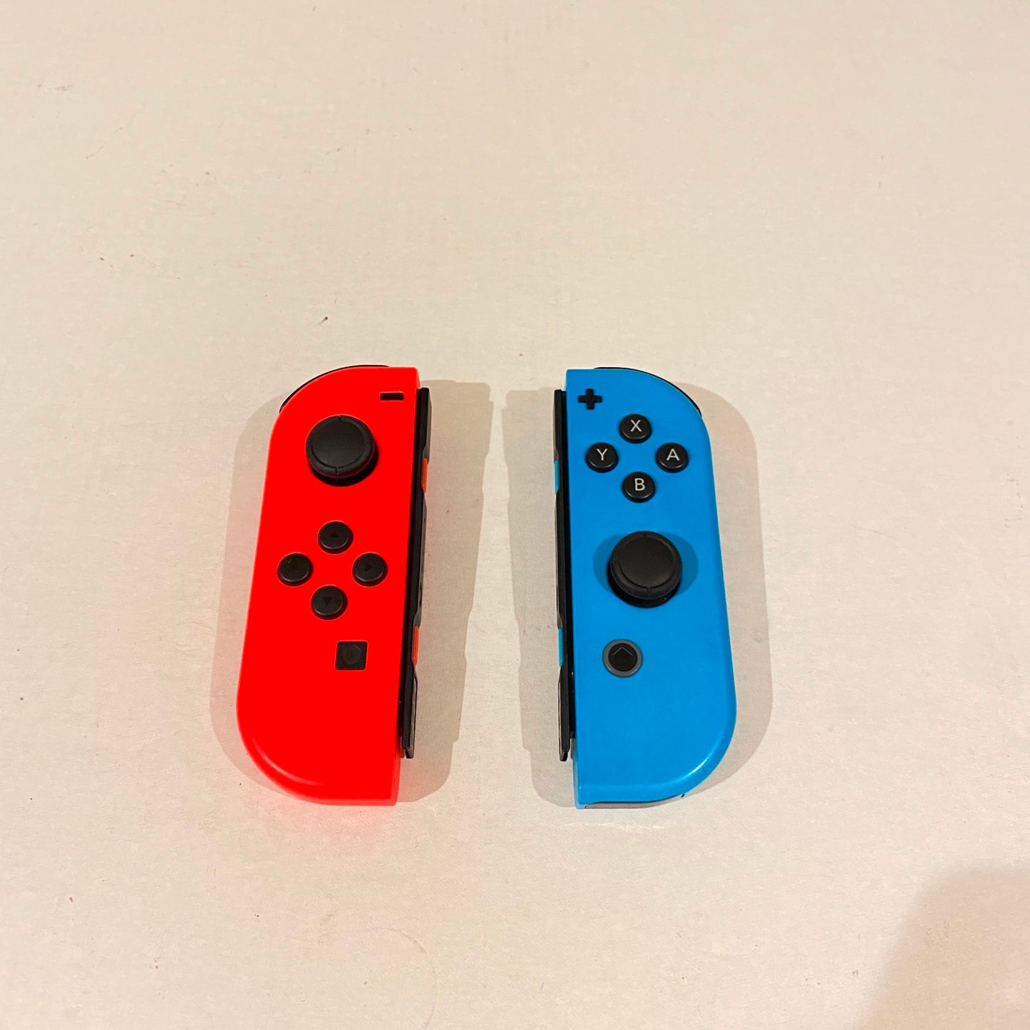Nintendo Switch Left and Right JoyCons Controllers - Neon Red/Neon Blue