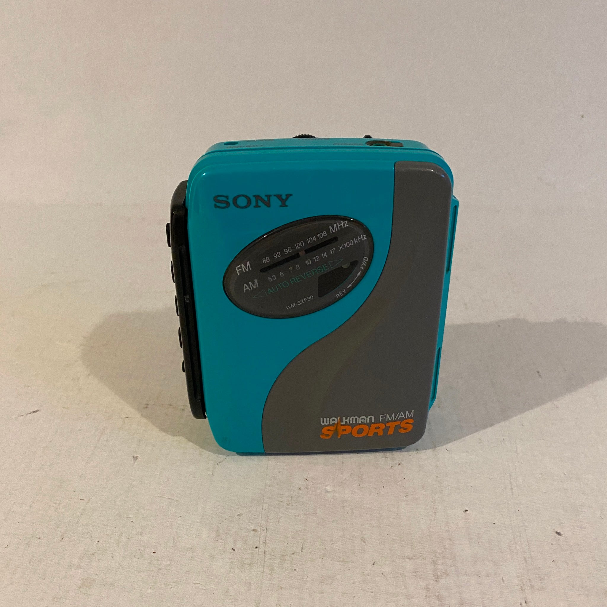 Teal Sony Sports Walkman AM/FM Radio - Missing volume knob – neilgilbert.ca